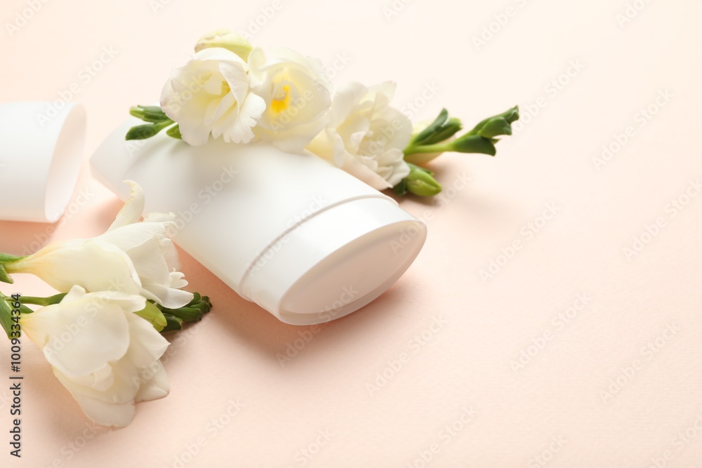 Solid deodorant and beautiful eustoma flowers on beige background, closeup Solid deodorant and beautiful eustoma flowers on beige background, closeup