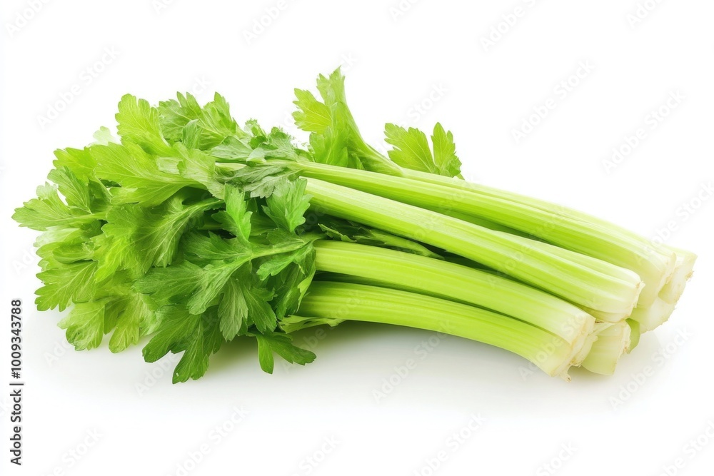 Fresh bunch of celery placed on a clean white surface Fresh bunch of celery placed on a clean white surface