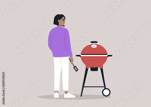 A culinary enthusiast stands confidently with a spatula in hand, ready to grill delicious food on a bright red barbecue grill, enjoying a beautiful day outdoors