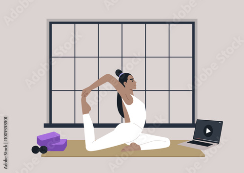A dedicated practitioner engages in an online yoga session at home, gracefully performing a complex pose by a large window in natural light