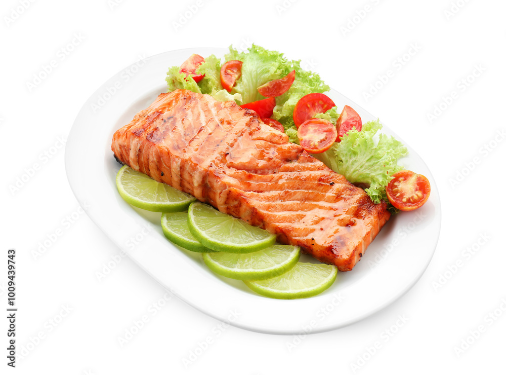 Delicious grilled salmon fillet with vegetable salad and lime isolated on white Delicious grilled salmon fillet with vegetable salad and lime isolated on white