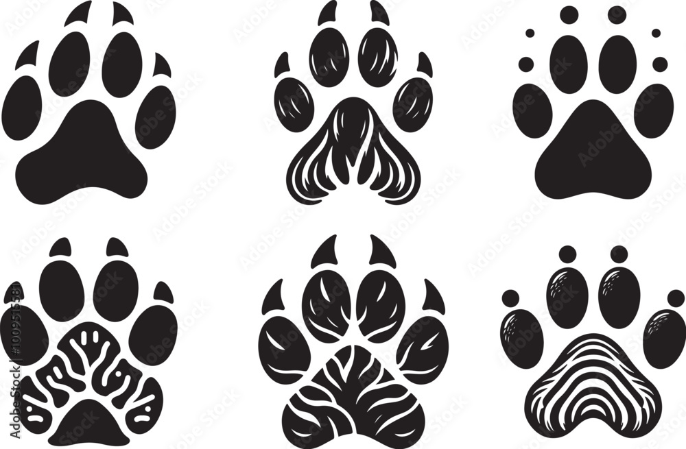 Fototapeta premium set of black silhouettes of animals footprints