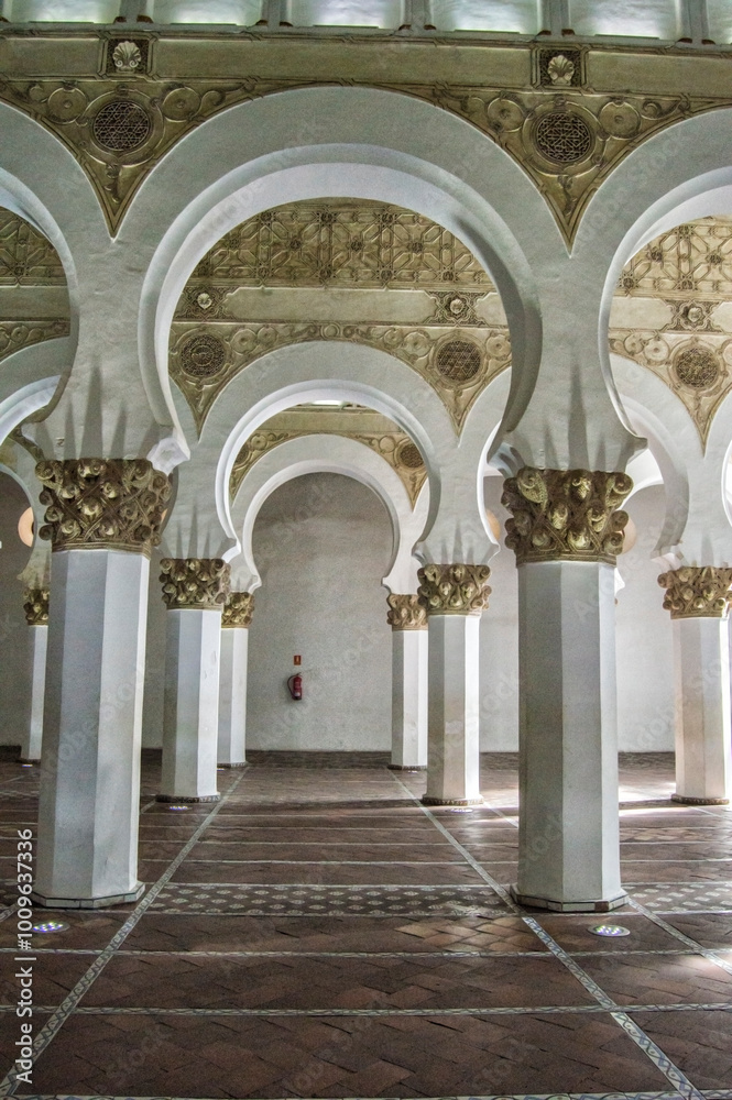 Fototapeta premium Interior with Mudejar arches of Santa Maria la Blanca in Toledo. Spain