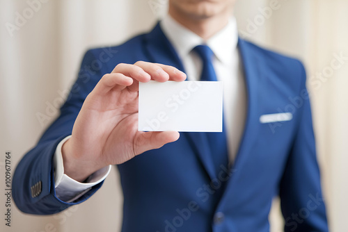 A Person Holding a Business Card
