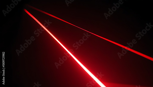 red laser light cutting dark creating dramatic effect photo