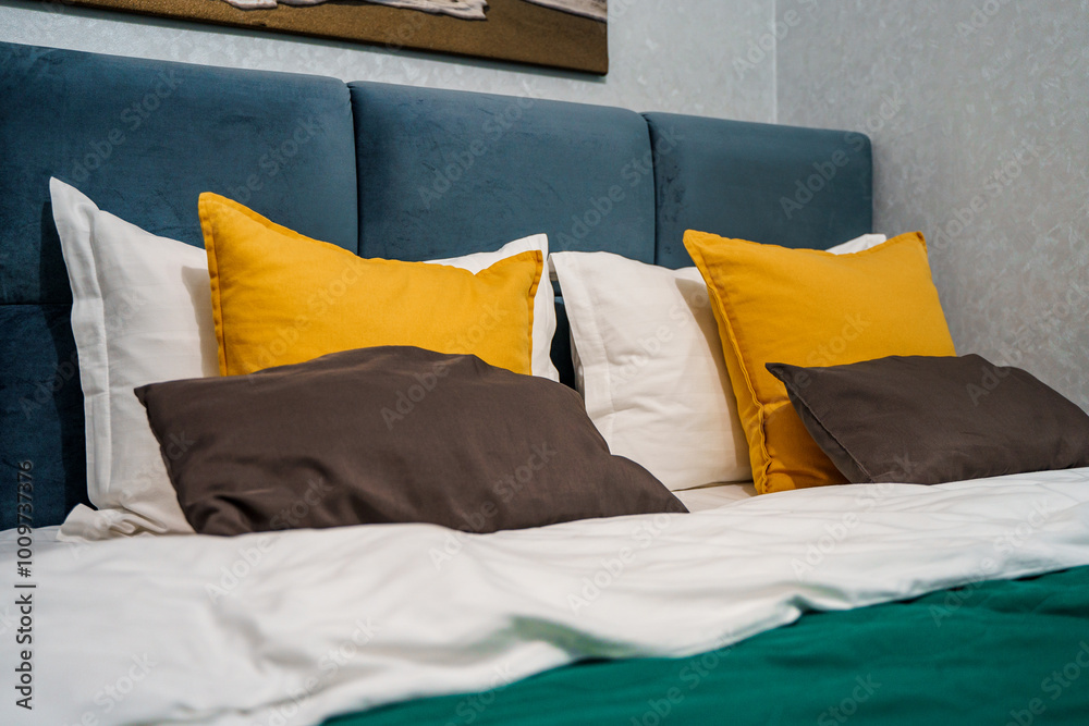 Εκτύπωση καμβά Colorful pillows of the bed in the bedroom