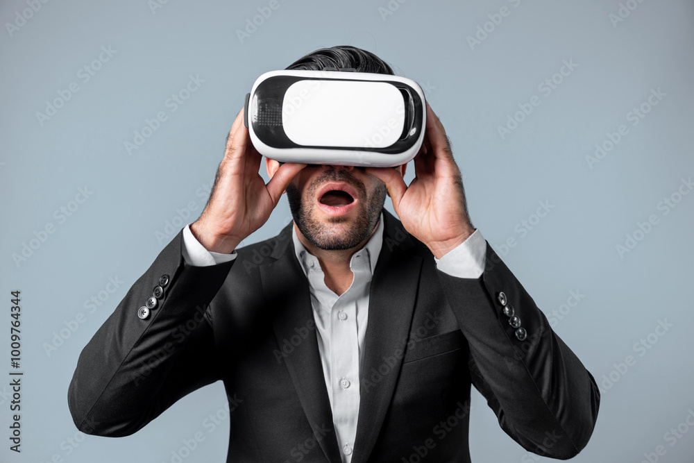Close up of smart project manager looking financial graph hologram from VR glass. Professional business man surprised while checking financial plan from virtual reality world and metaworld. Deviation. Close up of smart project manager looking financial graph hologram from VR glass. Professional business man surprised while checking financial plan from virtual reality world and metaworld. Deviation.