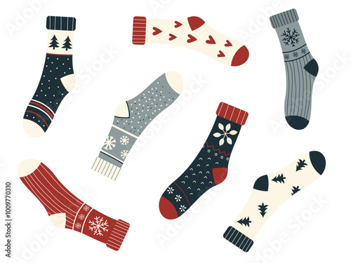 Set of cozy winter socks with playful patterns, including snowflakes, hearts, trees, and stripes. These festive socks are arranged in a fun, scattered layout, showcasing a cute and minimal flat style.