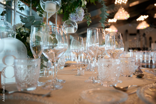 Elegant wedding table setting with glassware and decorations photo