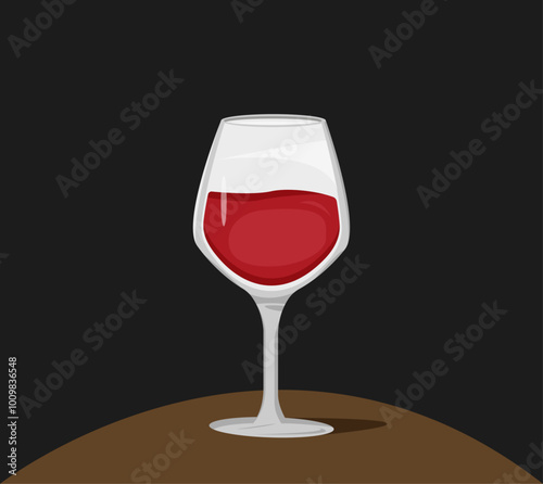 Elegant red wine glass on dark background