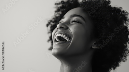 Joyful Young Woman with Natural Hair Smiling