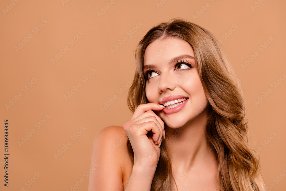 Photo of pretty lovely cute girl touch mouth look empty space isolated on beige color background Photo of pretty lovely cute girl touch mouth look empty space isolated on beige color background