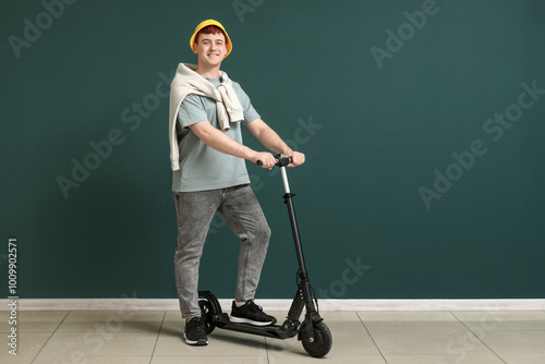 Young man with modern elect...