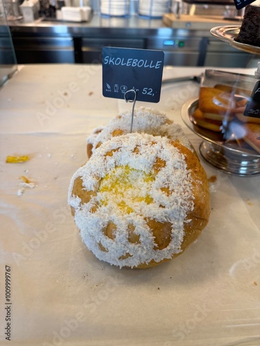 Skolebolle, Stortorget, Tromsø, Norway - nostalgic treat skolebrød for 52 NOK displayed at small caffe shop in town as a local specialty