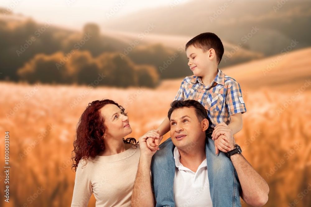 happy family walks with children in summer field happy family walks with children in summer field