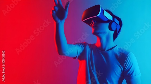 Young man in a VR headset, reaching out in a virtual world.