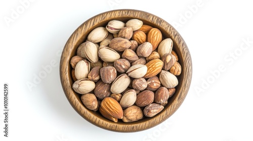 A wooden bowl filled with a variety of nuts, showcasing different shapes and colors.