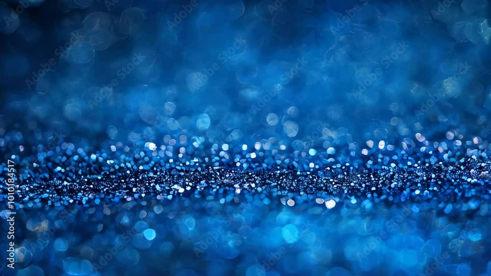 Abstract blue bokeh background with glittering particles, ideal for festive or celebratory concepts. Abstract blue bokeh background with glittering particles, ideal for festive or celebratory concepts.