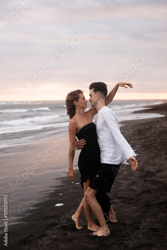 A Couple In Love, Husband And Wife, On The Beach Near The Ocean, Bali.