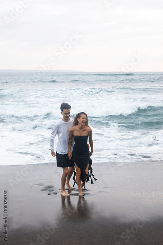A Couple In Love, Husband And Wife, On The Beach Near The Ocean, Bali.