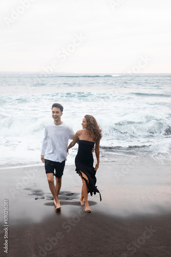 A Couple In Love, Husband And Wife, On The Beach Near The Ocean, Bali.