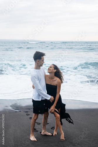 A Couple In Love, Husband And Wife, On The Beach Near The Ocean, Bali.