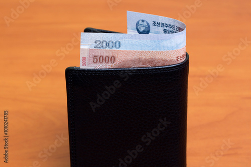 North Korean won in the black wallet photo