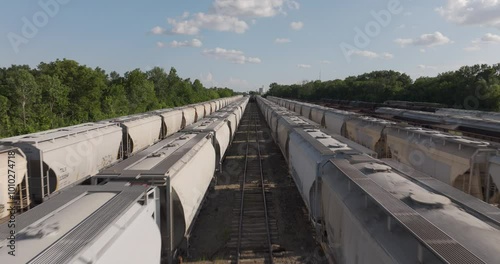 Freight train cars in kansas yard above low fly