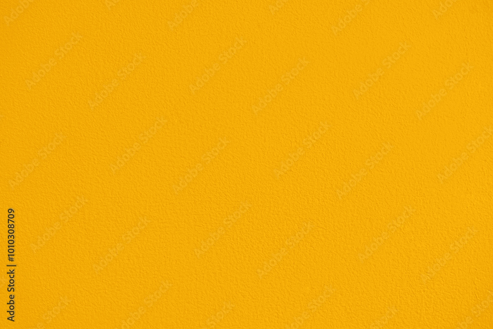 Yellow orange paint concrete wall texture background. Grunge and rough wall. Vintage style of yellow wall texture. Yellow orange paint concrete wall texture background. Grunge and rough wall. Vintage style of yellow wall texture.