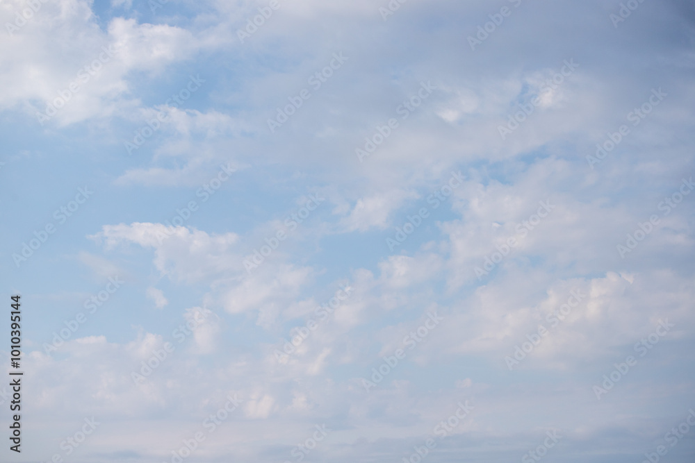 Sky background with clouds. White clouds against a blue sky. Sky background with clouds. White clouds against a blue sky.