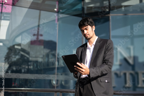 Confident Businessman in Suit Holding Tablet and Coffee Outdoors Urban Professional Work