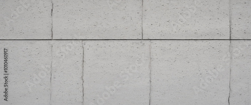 Modern style background and cement wall texture. white cement cinder block wall texture - background. Panorama of White Granite Exterior Wall Tiles Pattern with Smooth Surface texture and background. 