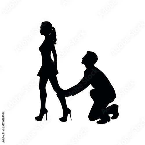 a man kneeling down and holding the hand of a woman. The man is kneeling on the ground with his knees bent and his hands clasped together in front of him