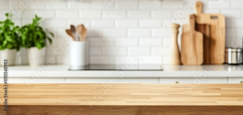 Wooden counter in a bright kitchen, blurred pots and pans in the background, cozy farmhouse-style kitchen interior