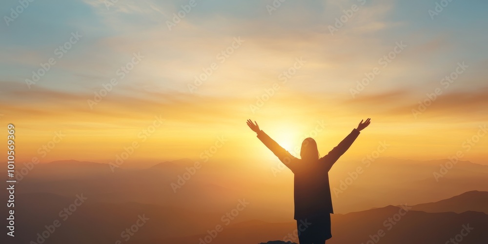Person celebrating sunrise on mountain, arms raised in joy and triumph, embracing the beauty and serenity of nature. Person celebrating sunrise on mountain, arms raised in joy and triumph, embracing the beauty and serenity of nature.