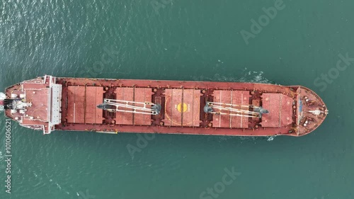Aerial view of dry cargo ship. Bulk carrier cargo vessel. Ship logistic and transportation business industry.