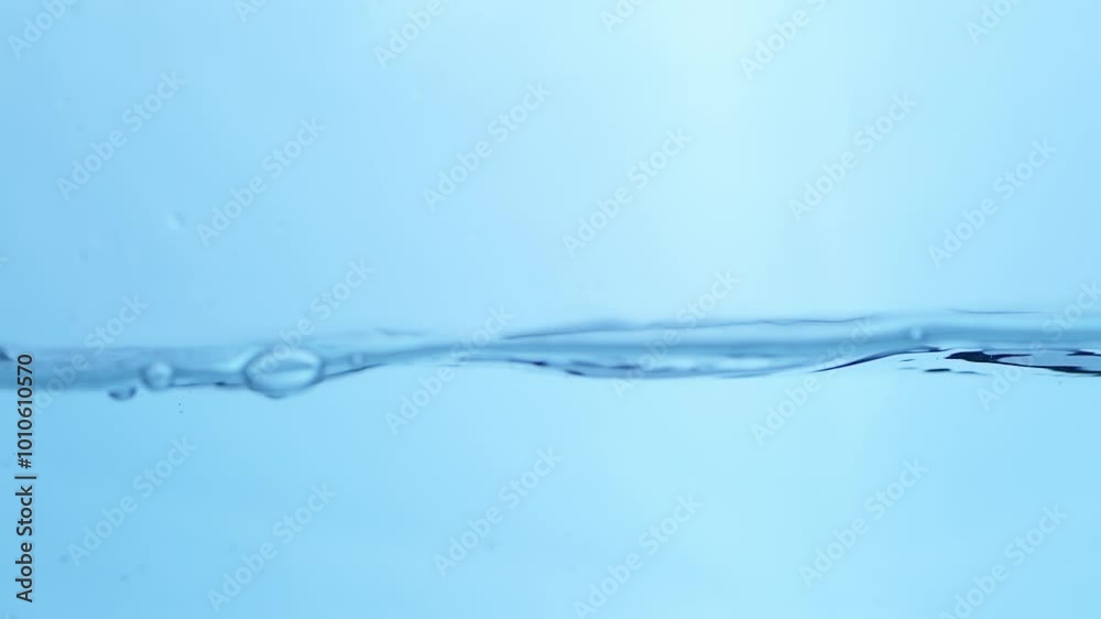 Water droplets splash on a white background, creating abstract patterns that symbolize clarity, freshness, and clean motion. Water droplets splash on a white background, creating abstract patterns that symbolize clarity, freshness, and clean motion.