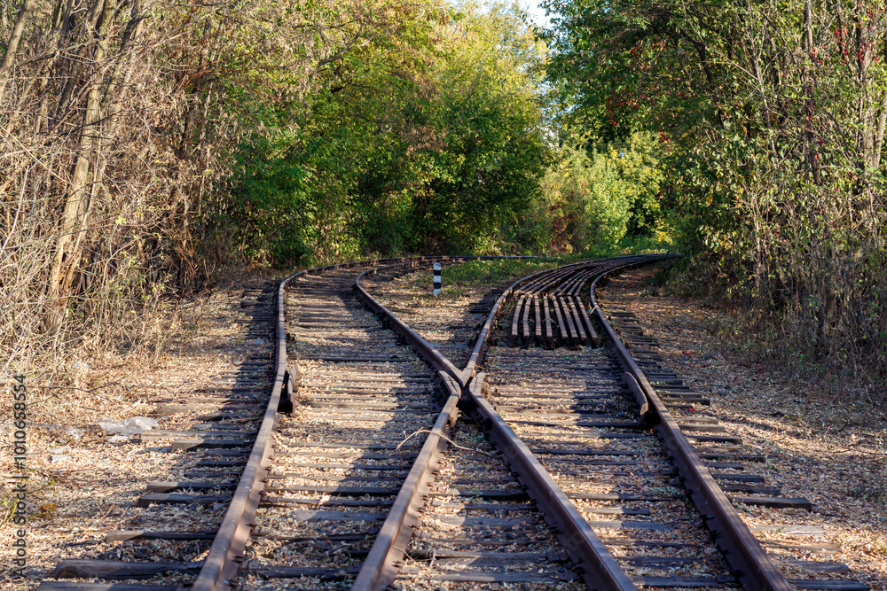 Railway tracks in the park area of autumn Kharkov Railway tracks in the park area of autumn Kharkov