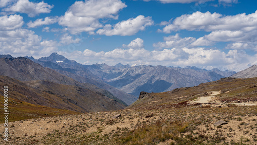 Scenic summer landscape view of high-altitude Deosai Plains with Nanga Parbat in clouds, Astore, Gilgit-Baltistan, Pakistan