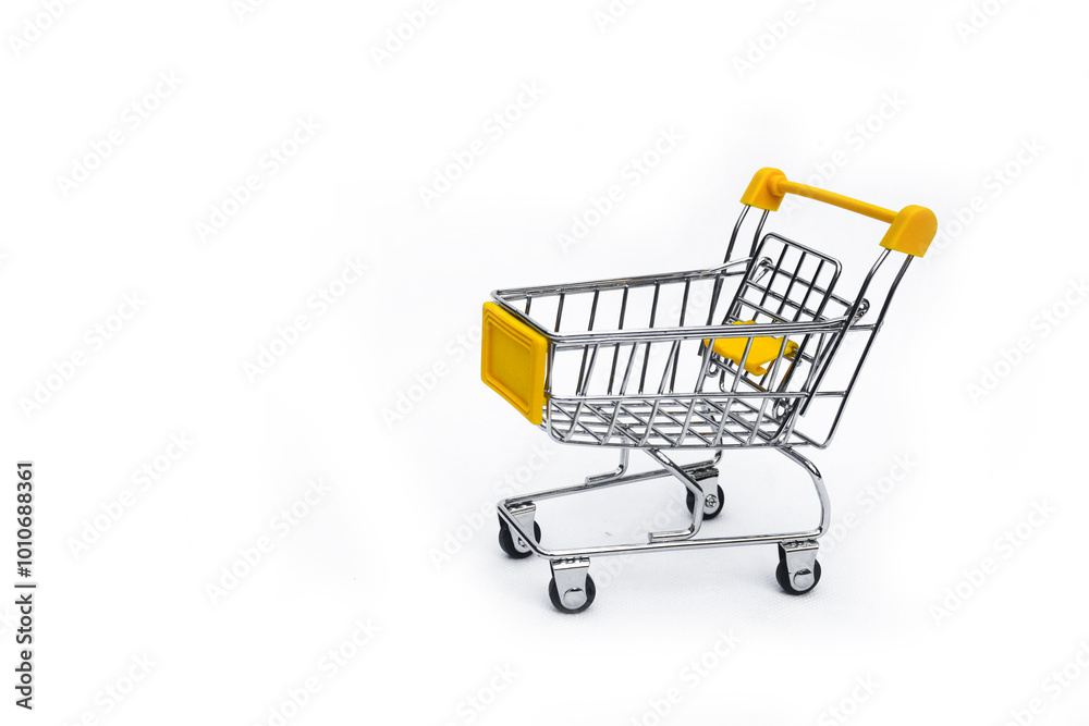 Mini model of red shopping cart in supermarket trolley,Empty shopping cart with isolated blank screen with clipping path on transparent background., closeup Mini model of red shopping cart in supermarket trolley,Empty shopping cart with isolated blank screen with clipping path on transparent background., closeup