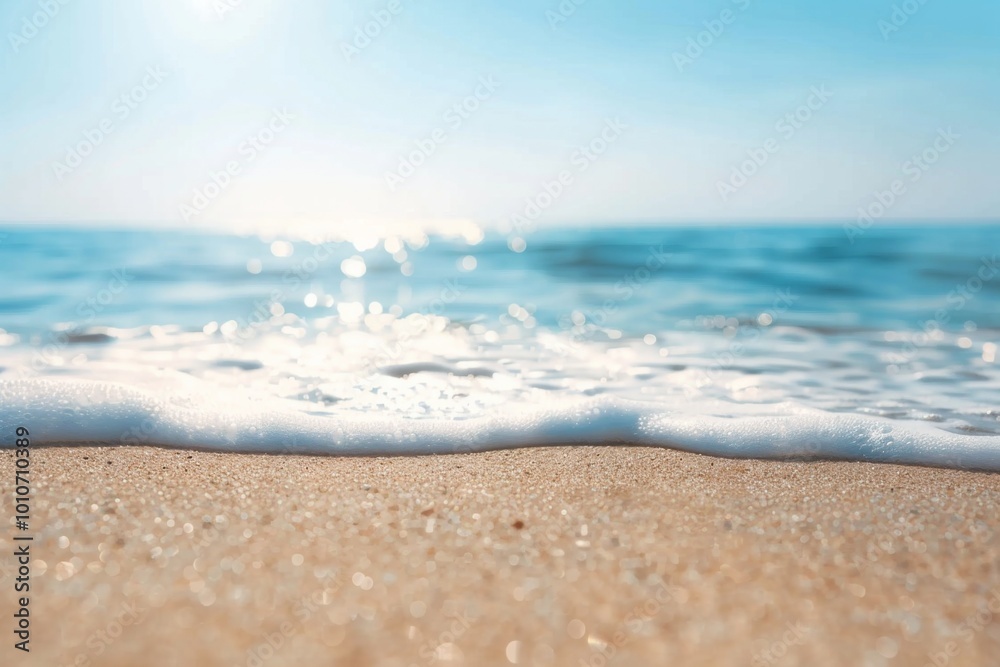 Feel the warmth of the summer sun as gentle waves kiss the shores, creating a serene atmosphere perfect for relaxation and enjoyment by the sea.