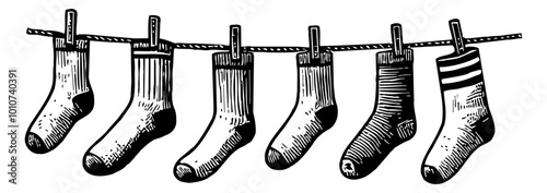 clothes hanging on a clothesline engraving black and white outline