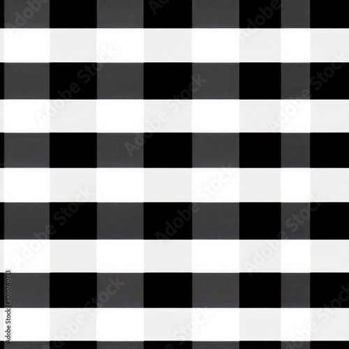 A simple black and white checkered pattern, featuring alternating squares that create a classic, minimalist design. photo