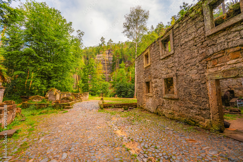 Obraz premium Ruins of water mill Dolsky mlyn in Bohemian Switzerland, Czech Republic. The place where Czech fairy tales are filmed