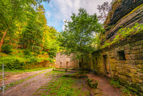 Ruins of water mill Dolsky mlyn in Bohemian Switzerland, Czech Republic. The place where Czech fairy tales are filmed photo