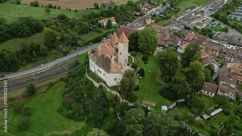 Pull out drone shot of nice La Sarraz Castle in Vaud Switzerland photo