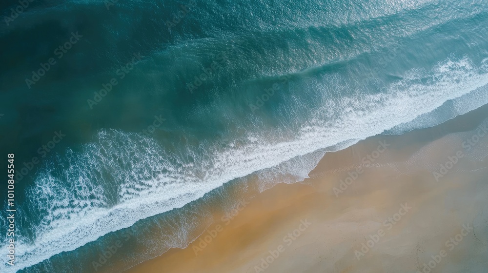 Φωτογραφία Aerial top-down shot of the Vietnam coast, with ocean waves gently crashing onto the sandy beach, creating a calm and serene vacation backdrop