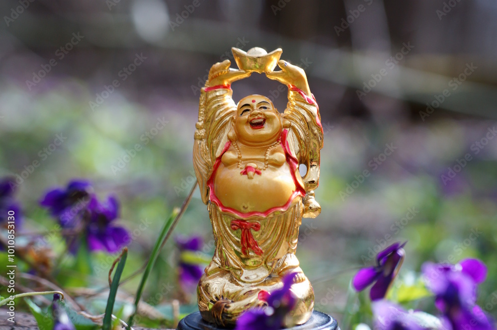Εκτύπωση καμβά A statuette of a smiling Buddha. Religion and culture.