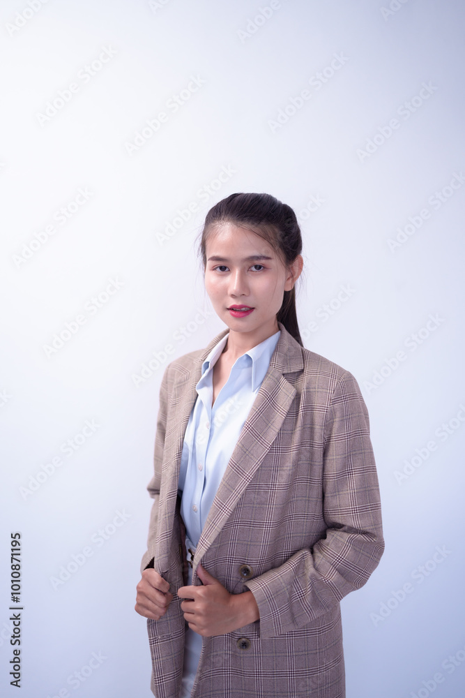 Smiling Beautiful asian young Business woman on a white background. Asian female company worker smiling confident and cheerful Smiling Beautiful asian young Business woman on a white background. Asian female company worker smiling confident and cheerful