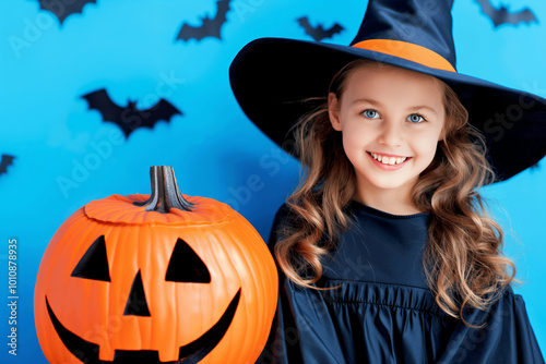 Cheerful Young Witch with Jack-o'-Lantern Celebrating Halloween